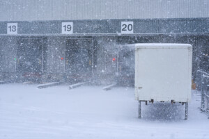 snow covered lorry loading bay