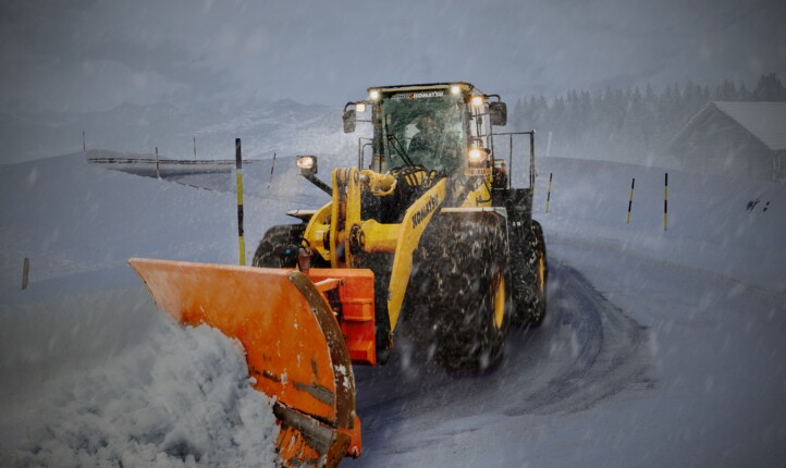 Tractor Removing Snow From Road