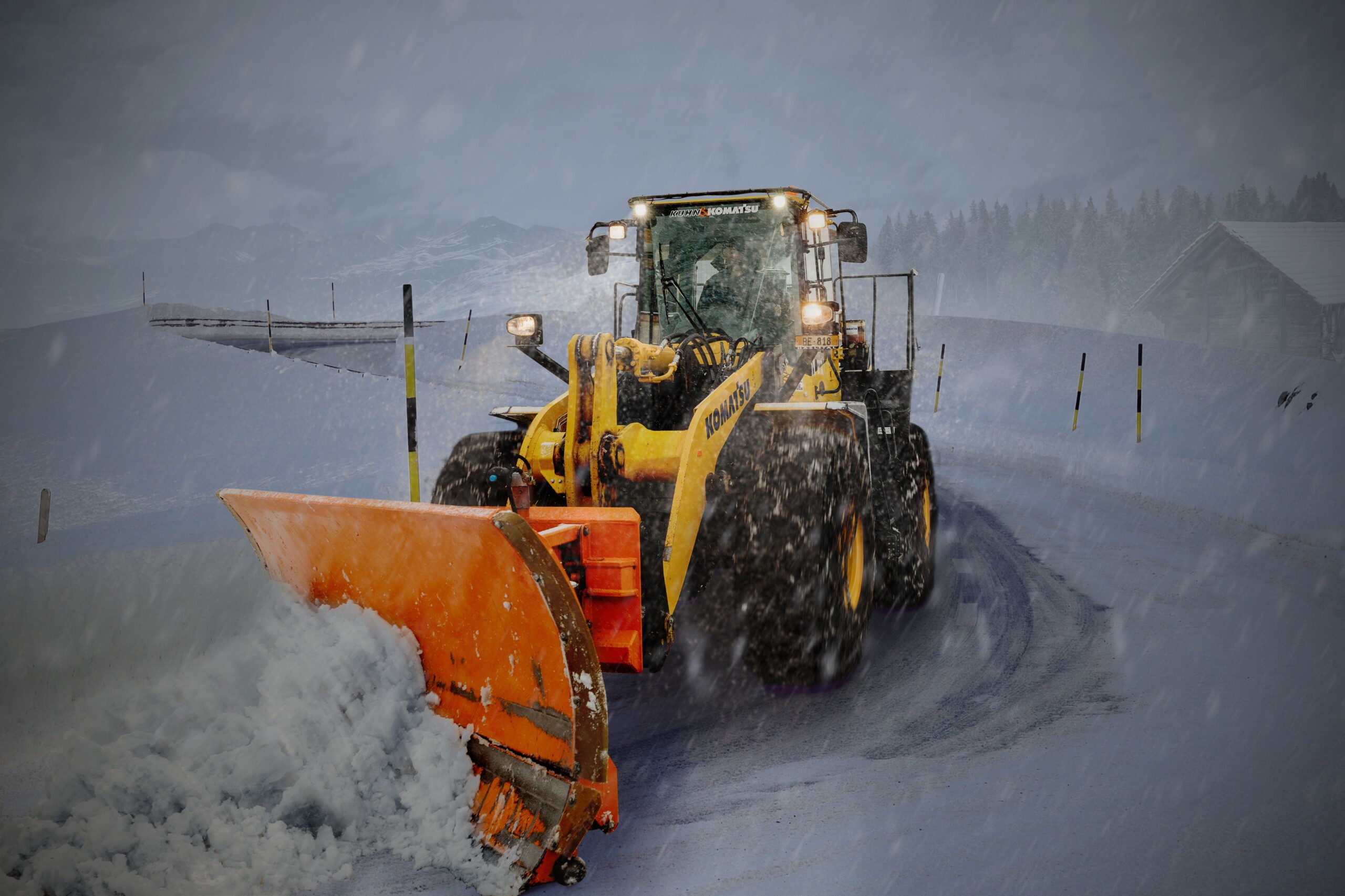 Tractor Removing Snow From Road